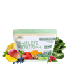 Image of a bottle of Optimal Complete Nutrition Plus. around the bottle is a blueberry, some mangos, spinach, bananas, and some tomatoes.