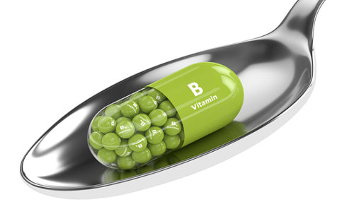 3d rendering of B6 vitamin pill on spoon