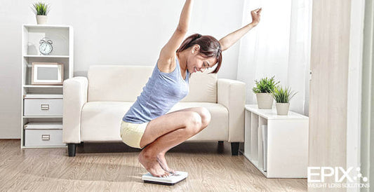 Woman-Excited-To-Get-Through-Weight-Loss-Plateau
