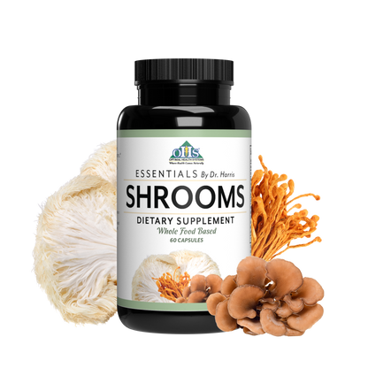 Image of a bottle of Essentials Shrooms. Around the bottle are Mitaki, white button, and Chaga mushrooms.