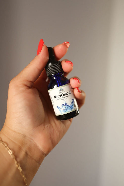 image of someone holding Nanoblue in their hand