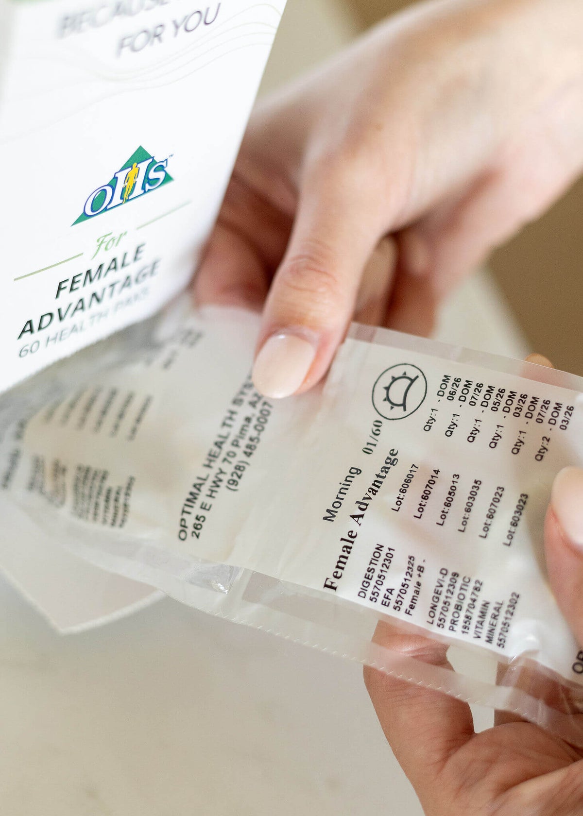 advantage pak being torn off supplement roll by hands